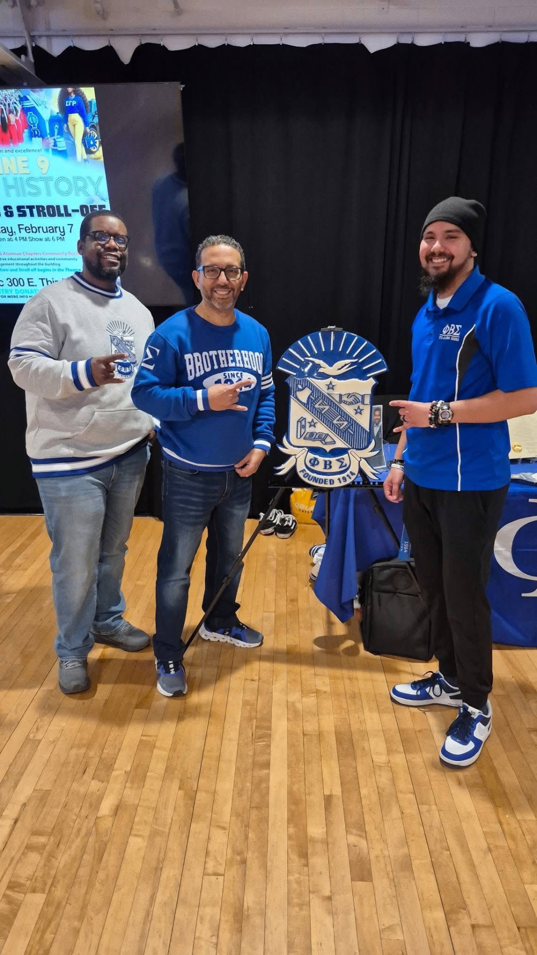Brothers with Phi Beta Sigma crest